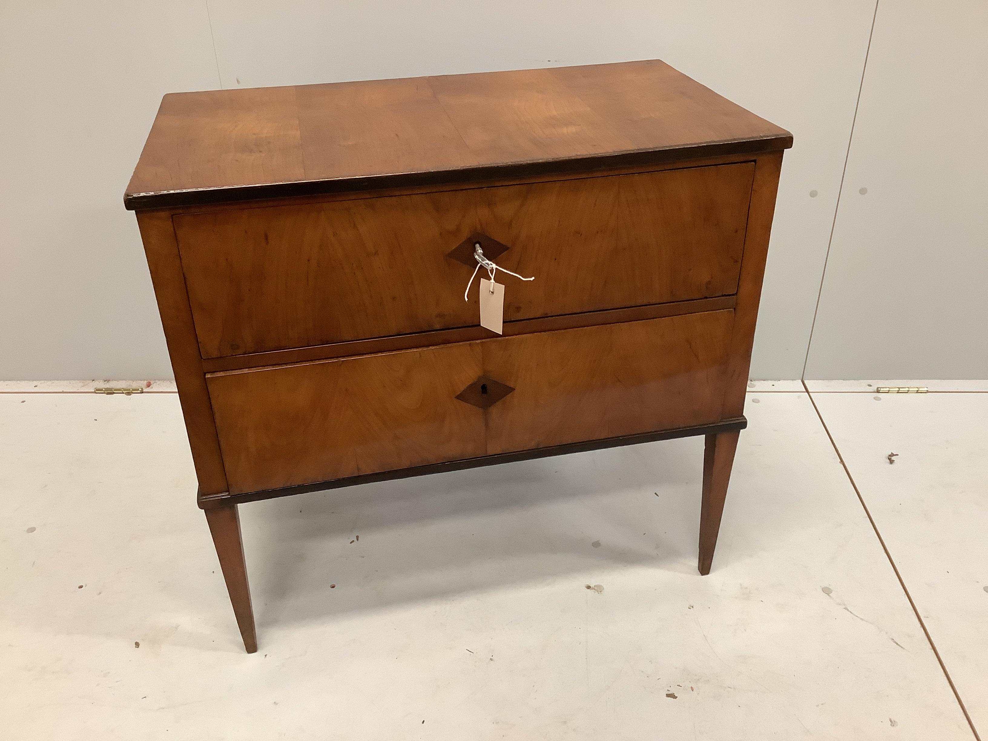 A 19th century Biedermeier birch two drawer chest, width 81cm, depth 45cm, height 76cm